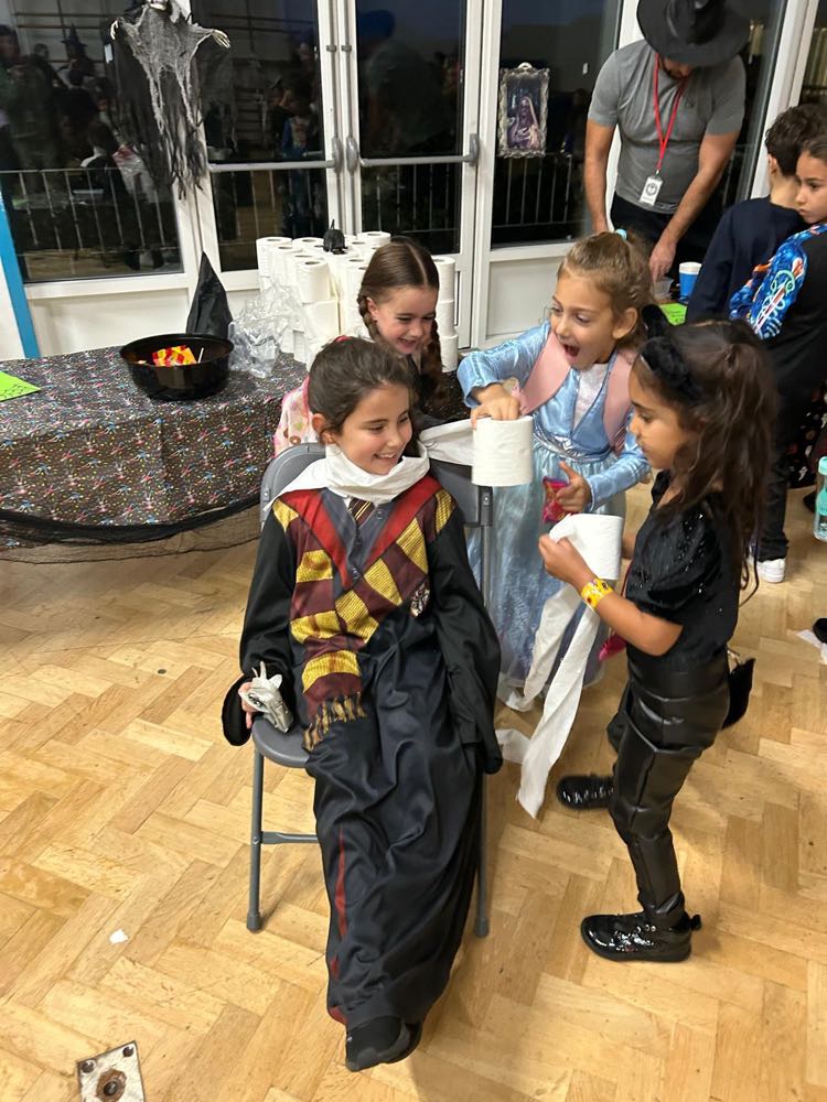 Children in costume at our Halloween celebration