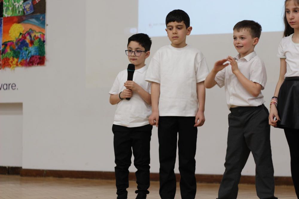 Children performing in our 25th of March play