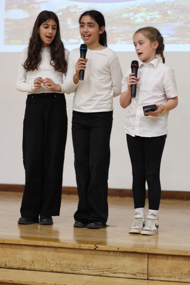 Children performing in our 25th of March play