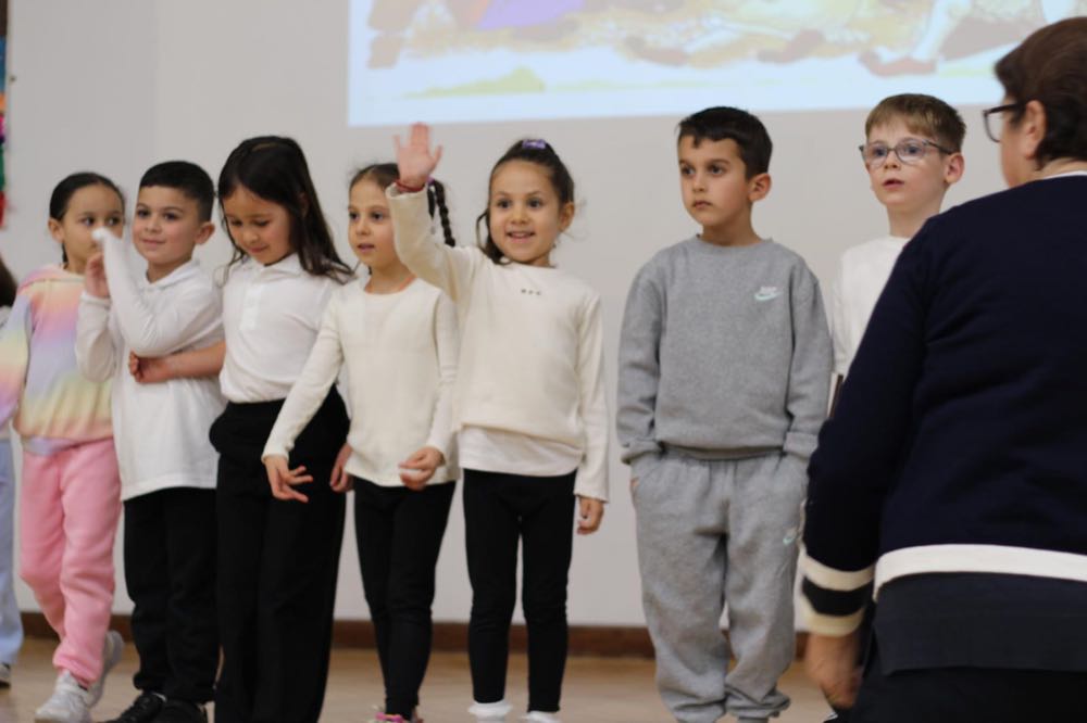 Children performing in our 25th of March play