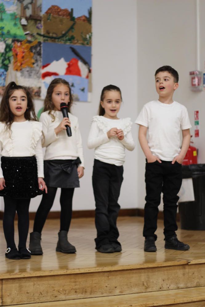 Children performing in our 25th of March play