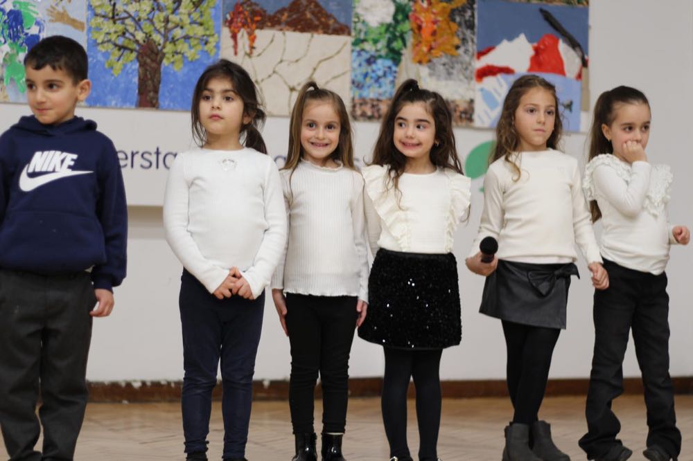 Children performing in our 25th of March play