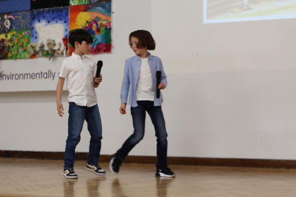 Children performing in our 25th of March play