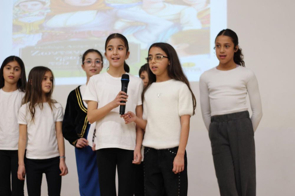 Children performing in our 25th of March play