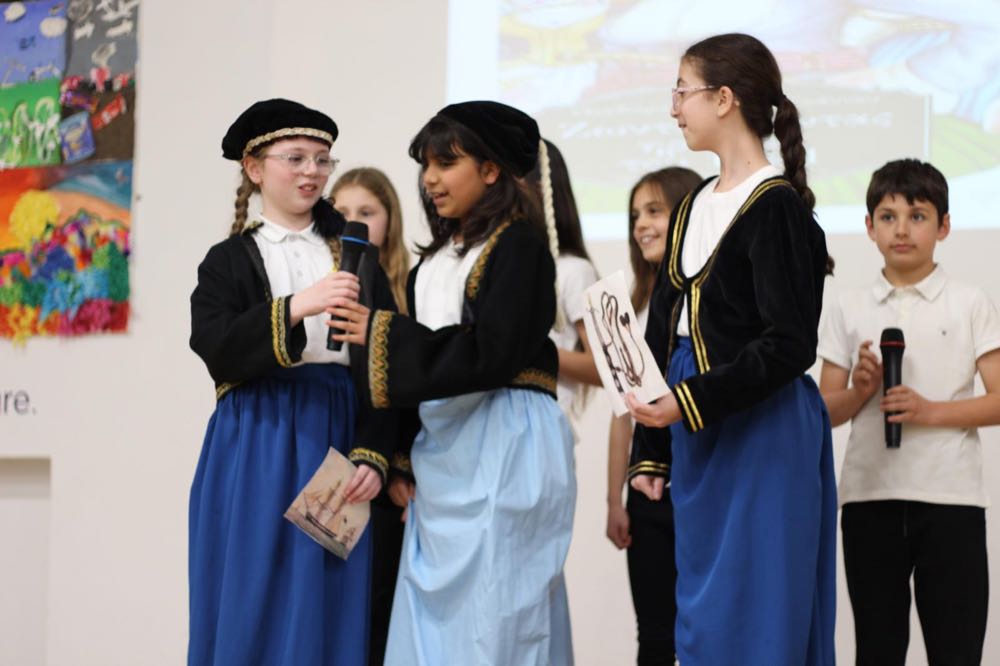 Children performing in our 25th of March play