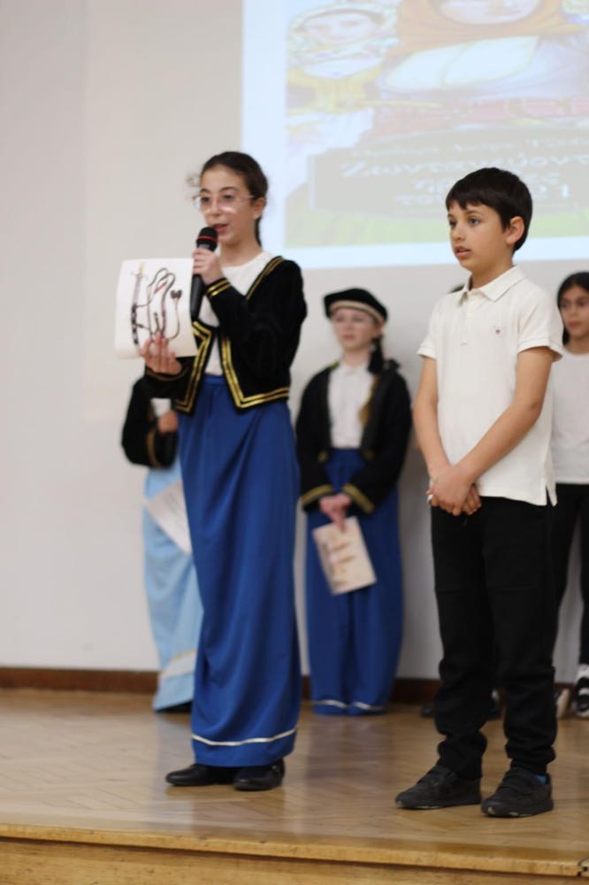 Children performing in our 25th of March play