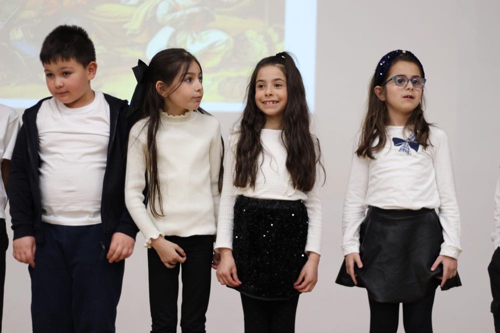 Children performing in our 25th of March play