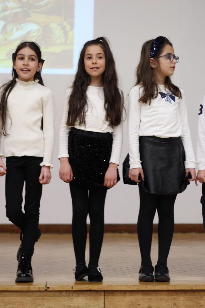 Children performing in our 25th of March play