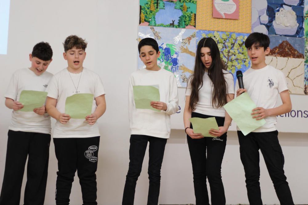 Children performing in our 25th of March play