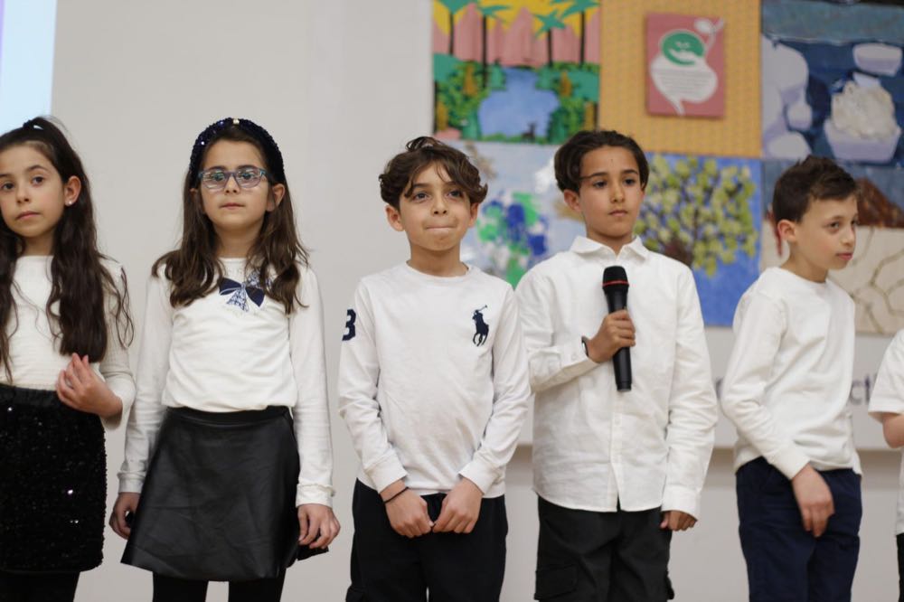 Children performing in our 25th of March play