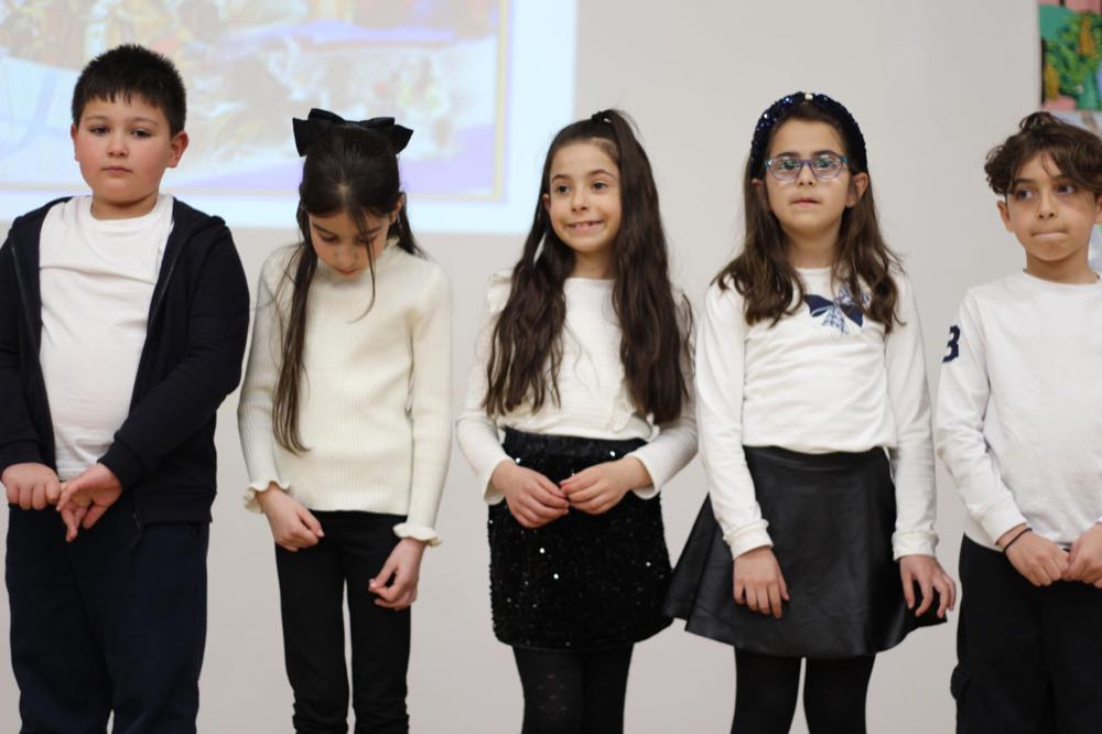 Children performing in our 25th of March play
