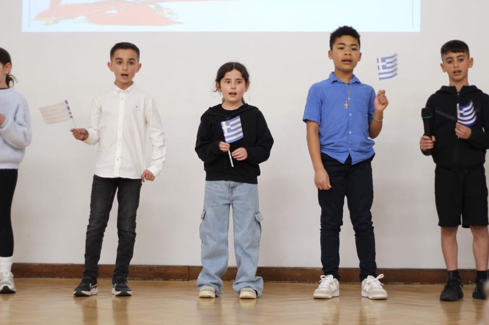 Children performing in our 25th of March play