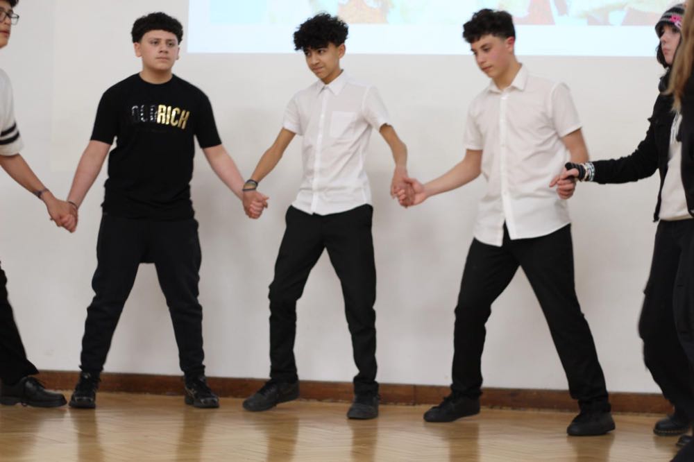 Children performing in our 25th of March play