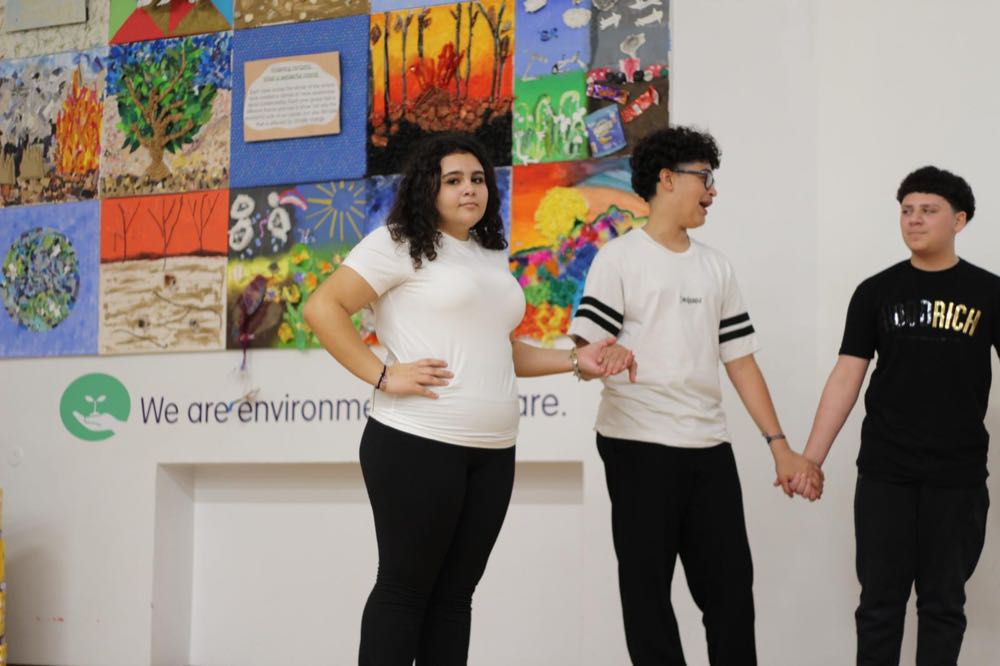 Children performing in our 25th of March play