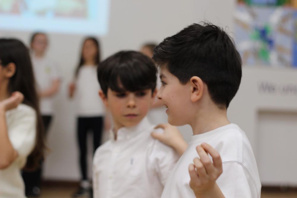Children performing in our 25th of March play