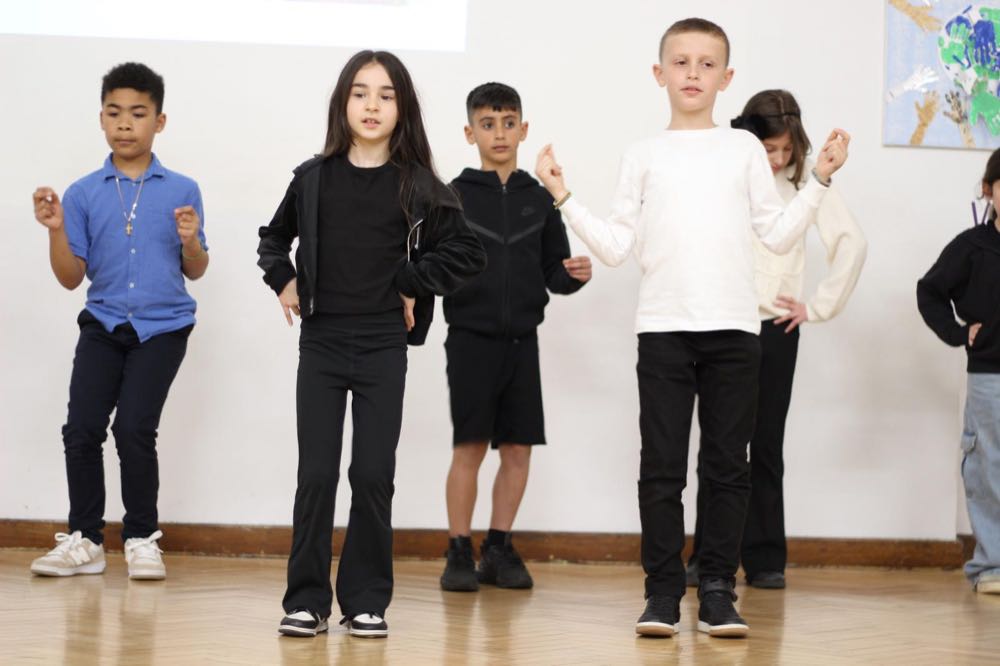Children performing in our 25th of March play